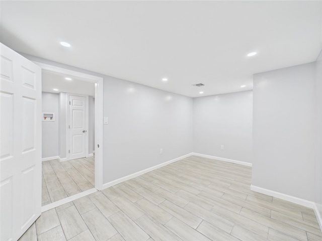 495 Easton St, Ronkonkoma, NY 11779 - basement featuring baseboards, light wood finished floors, and recessed lighting