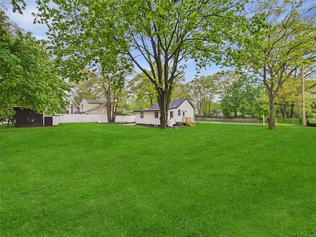 495 Easton St, Ronkonkoma, NY 11779 - view of yard featuring an outbuilding