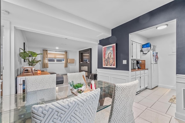 dining space with light tile patterned floors