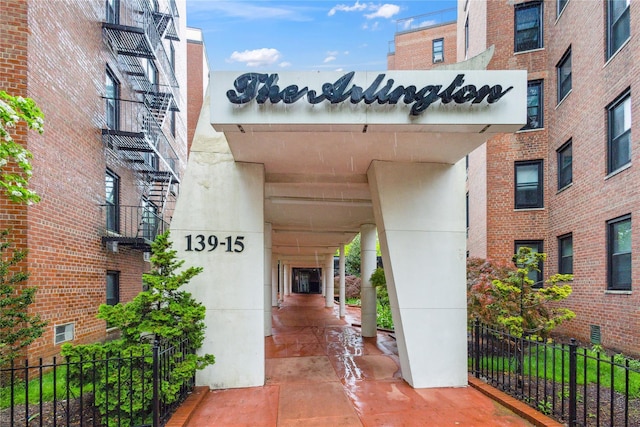 139-15 83rd Ave Unit 409, Briarwood, NY 11435 - view of exterior entry featuring fence
