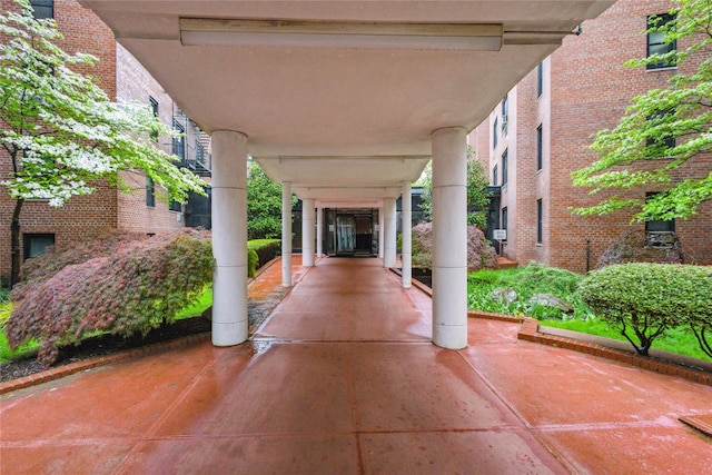 139-15 83rd Ave Unit 409, Briarwood, NY 11435 - view of patio / terrace featuring a carport