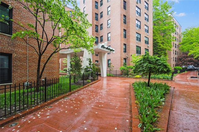 139-15 83rd Ave Unit 409, Briarwood, NY 11435 - view of home's community with fence