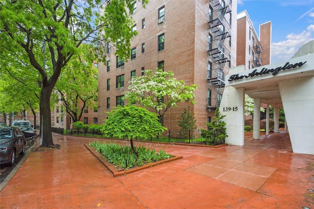 139-15 83rd Ave Unit 409, Briarwood, NY 11435 - view of apartment building / complex
