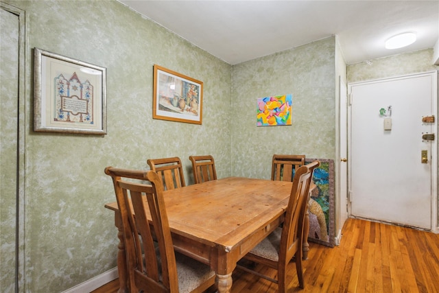 139-15 83rd Ave Unit 409, Briarwood, NY 11435 - dining room featuring hardwood / wood-style floors