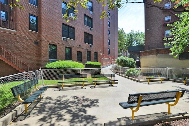 139-15 83rd Ave Unit 409, Briarwood, NY 11435 - surrounding community with fence