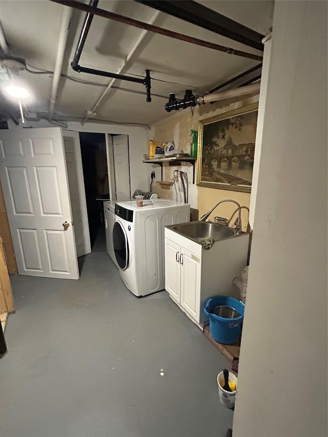 laundry area with cabinet space and washing machine and clothes dryer