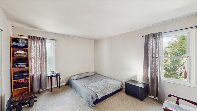 1079 Candlewood Rd, Brentwood, NY 11717 - carpeted bedroom with baseboards