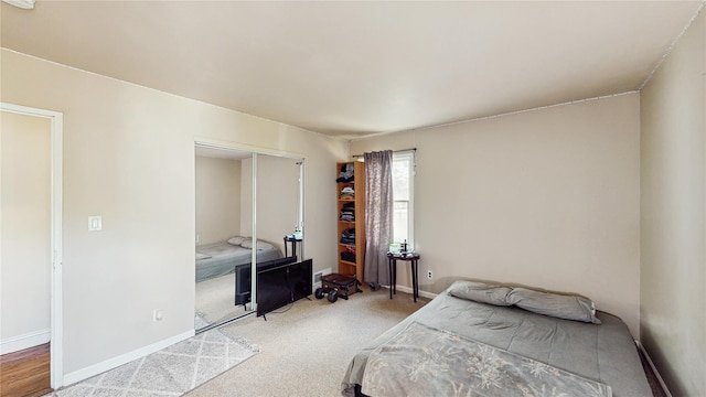 1079 Candlewood Rd, Brentwood, NY 11717 - bedroom featuring a closet, carpet flooring, and baseboards