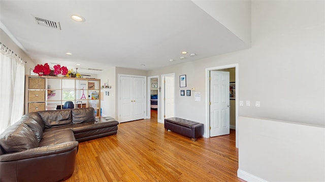 1079 Candlewood Rd, Brentwood, NY 11717 - living area with light wood-style flooring, recessed lighting, and baseboards
