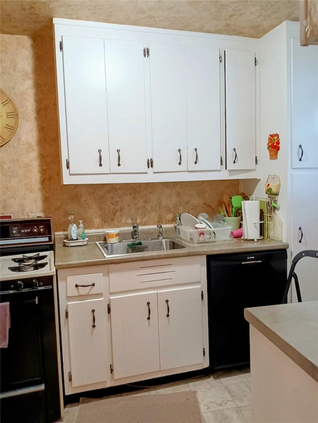 90-50 Union Tpke Unit 17K, Glendale, NY 11385 - kitchen featuring black appliances, light countertops, and white cabinets