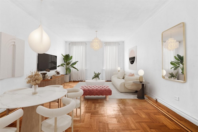 43-08 41st St Unit 5D, Sunnyside, NY 11357 - living area with baseboards, crown molding, and a chandelier