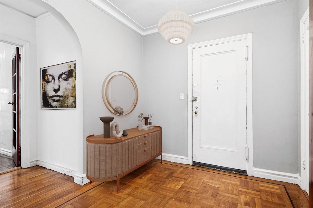 43-08 41st St Unit 5D, Sunnyside, NY 11357 - entryway with baseboards, arched walkways, and ornamental molding