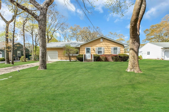 12 Harvard Dr, Hampton Bays, NY 11946 - ranch-style home featuring driveway, a front lawn, and an attached garage