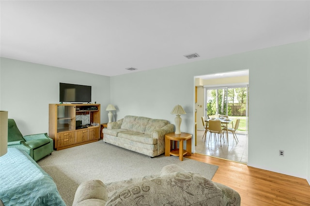 12 Harvard Dr, Hampton Bays, NY 11946 - living room with wood finished floors