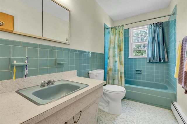 12 Harvard Dr, Hampton Bays, NY 11946 - full bath with a baseboard heating unit, toilet, tile walls, shower / bath combo, and wainscoting
