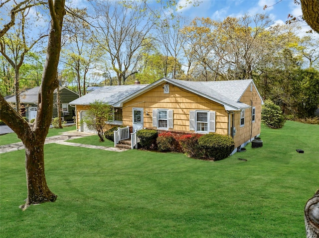 12 Harvard Dr, Hampton Bays, NY 11946 - single story home with a front yard and a shingled roof