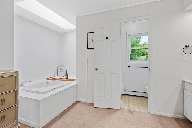 8 Red Oak Ct, Middletown, NY 10941 - bathroom with a baseboard heating unit, toilet, vanity, a bath, and baseboards