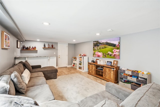 living room featuring bar and recessed lighting