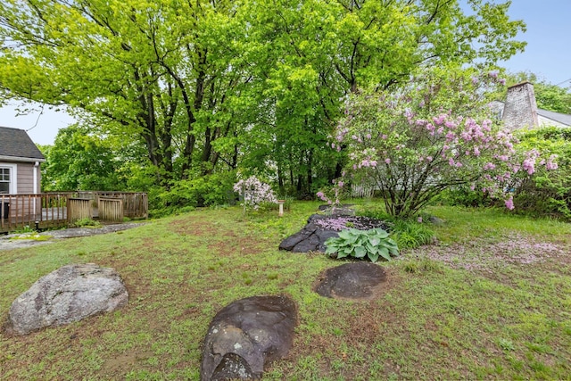 803 Oakwood Dr, Peekskill, NY 10566 - view of green lawn featuring a wooden deck