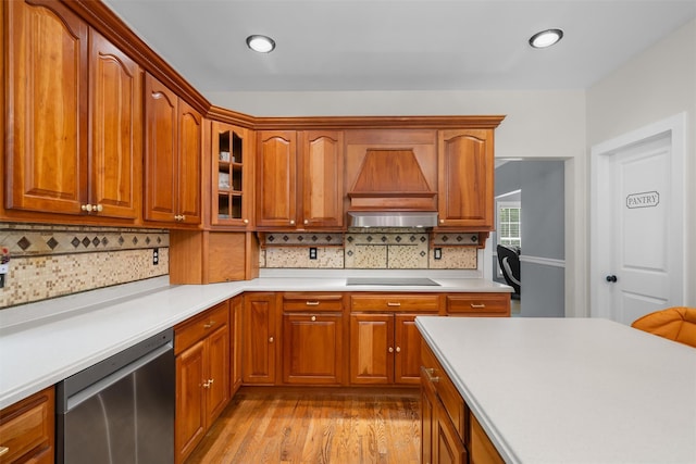 9 Hill Rd, Washingtonville, NY 10992 - kitchen with dishwasher, light wood finished floors, decorative backsplash, light countertops, and recessed lighting