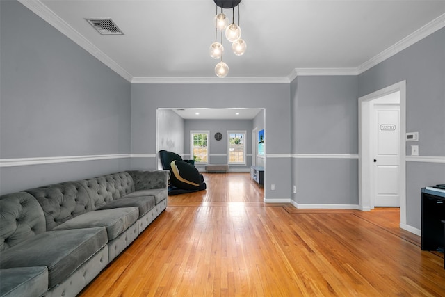 9 Hill Rd, Washingtonville, NY 10992 - living area featuring light wood-type flooring, crown molding, and baseboards