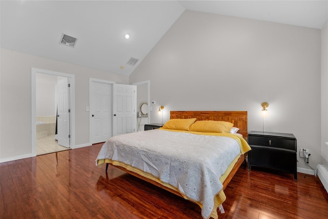 9 Hill Rd, Washingtonville, NY 10992 - bedroom with wood finished floors, high vaulted ceiling, baseboards, and ensuite bathroom