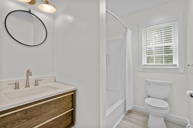 9 Hill Rd, Washingtonville, NY 10992 - bathroom with toilet, vanity, baseboards, wood finished floors, and shower / bathtub combination with curtain