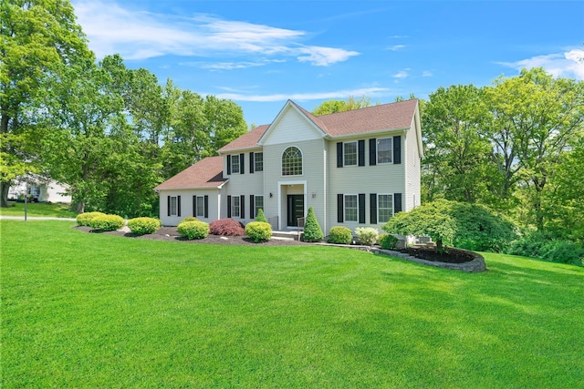 9 Hill Rd, Washingtonville, NY 10992 - colonial house featuring a front lawn and a shingled roof