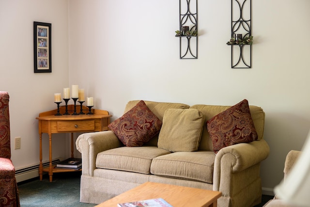 carpeted living room with a baseboard radiator and baseboards