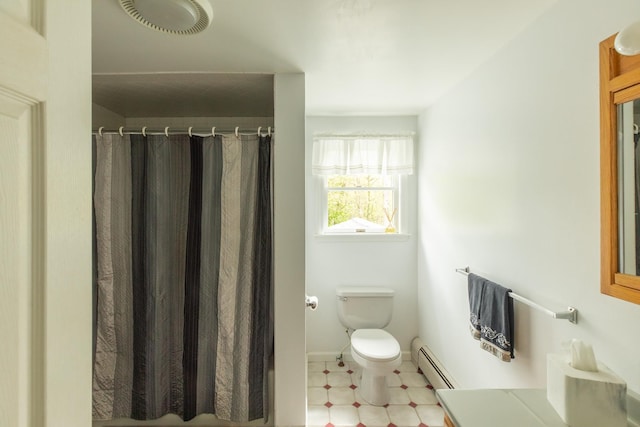 bathroom with baseboard heating, toilet, curtained shower, baseboards, and tile patterned floors
