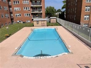community pool with fence