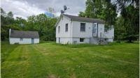2749 Rte 94, Washingtonville, NY 10992 - back of house with a lawn