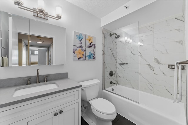 25 Rockledge Ave Unit 501, White Plains, NY 10601 - full bathroom featuring enclosed tub / shower combo, toilet, vanity, and a textured ceiling