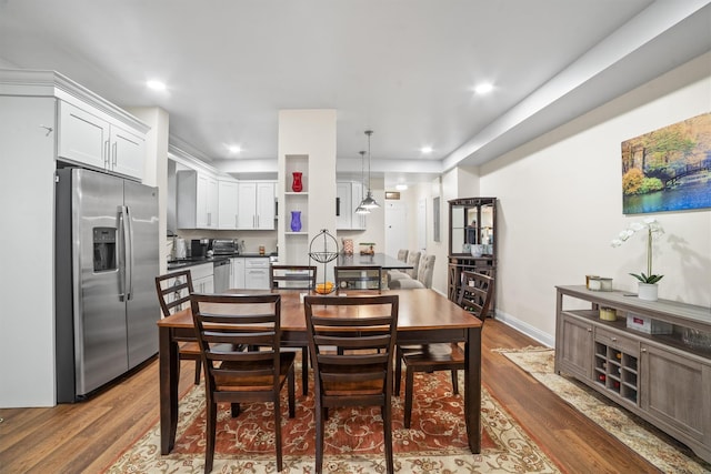 90 Bryant Ave Unit Ftd, White Plains, NY 10605 - dining room with wood finished floors and recessed lighting