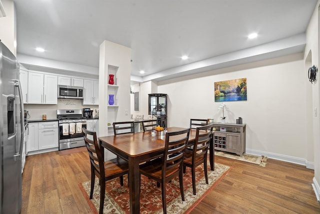 90 Bryant Ave Unit Ftd, White Plains, NY 10605 - dining area featuring recessed lighting, wood-type flooring, and baseboards
