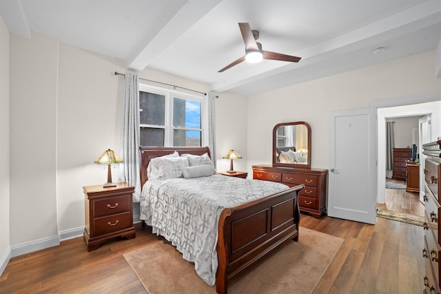 90 Bryant Ave Unit Ftd, White Plains, NY 10605 - bedroom featuring beamed ceiling, dark wood finished floors, baseboards, and ceiling fan