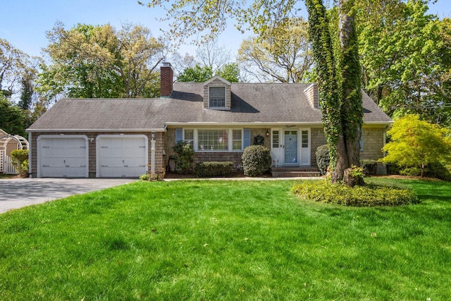 cape cod house featuring an attached garage, concrete driveway, a front yard, and roof with shingles
