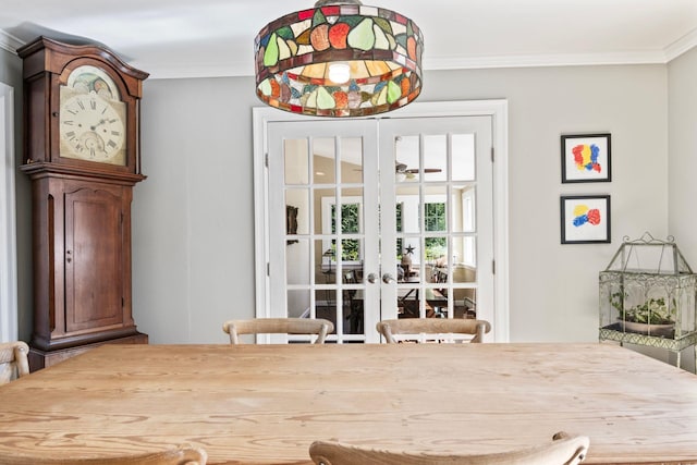 dining room with french doors and ornamental molding