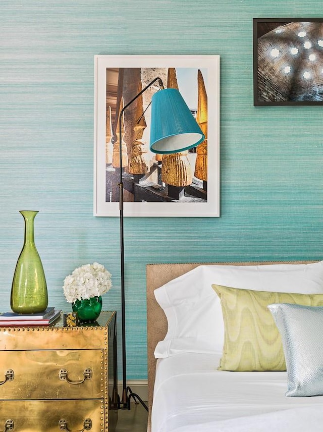 bedroom with wallpapered walls