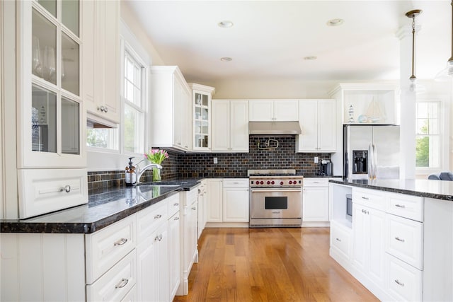 1145 Bay Haven Ln, Southold, NY 11971 - kitchen featuring appliances with stainless steel finishes, healthy amount of natural light, a sink, under cabinet range hood, and recessed lighting