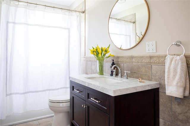 1145 Bay Haven Ln, Southold, NY 11971 - bathroom with tile walls, toilet, vanity, curtained shower, and tile patterned floors