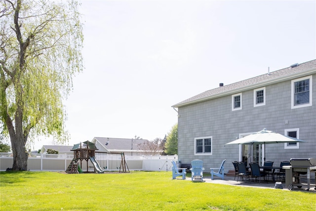 1145 Bay Haven Ln, Southold, NY 11971 - back of property with a playground and a patio