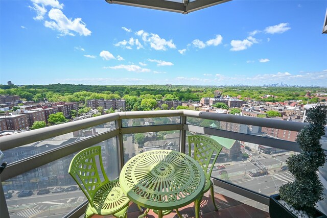 balcony featuring a city view