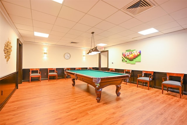 rec room with light wood-style floors, pool table, and a paneled ceiling