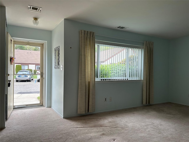 10 Monet Ct Unit 10, Middle Island, NY 11953 - carpeted empty room featuring baseboards