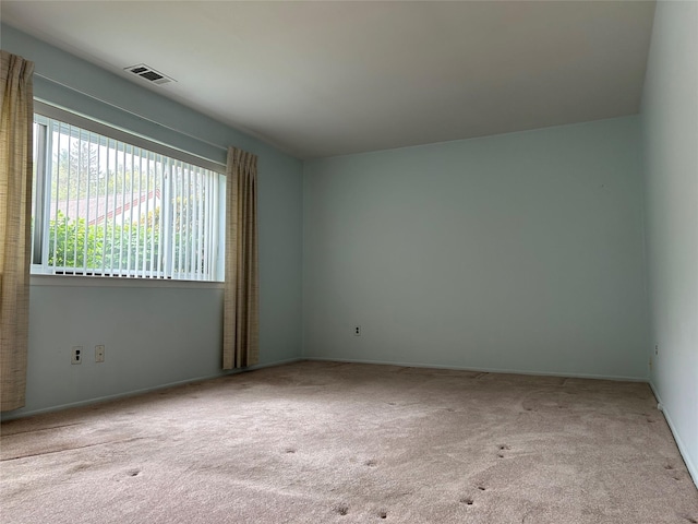 10 Monet Ct Unit 10, Middle Island, NY 11953 - carpeted empty room featuring baseboards