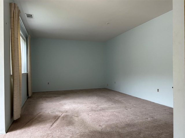 10 Monet Ct Unit 10, Middle Island, NY 11953 - empty room featuring carpet and baseboards