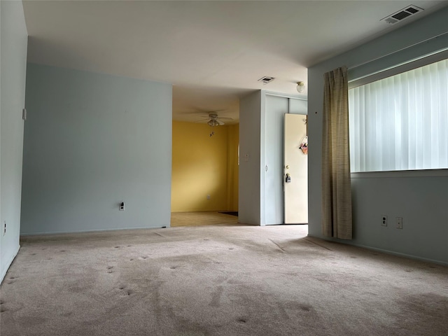 10 Monet Ct Unit 10, Middle Island, NY 11953 - carpeted empty room featuring ceiling fan