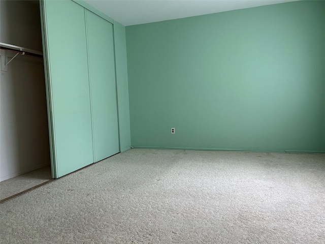 10 Monet Ct Unit 10, Middle Island, NY 11953 - unfurnished bedroom with carpet flooring and a closet