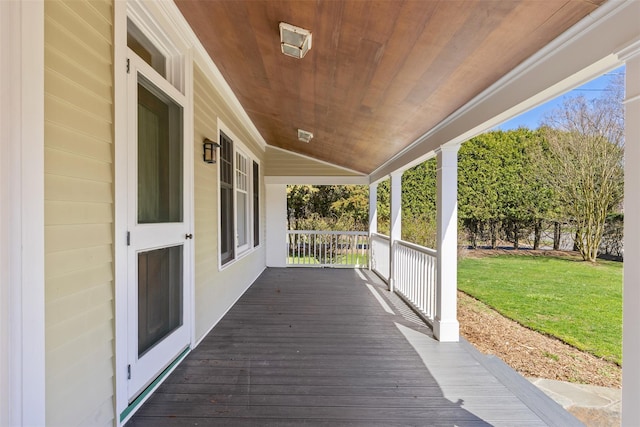 25105 Main Rd, Orient, NY 11957 - wooden terrace with a porch and a yard